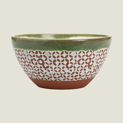 A ceramic bowl with a textured pattern, featuring a glossy olive green interior and rim, a white middle section covered in small brown leaf-like speckles, and a solid terracotta brown base.
