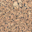Close-up of cork tile surface showing a speckled natural cork pattern in tan, beige, brown, and dark charcoal black.