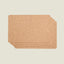 Set of cork placemats on a beige background